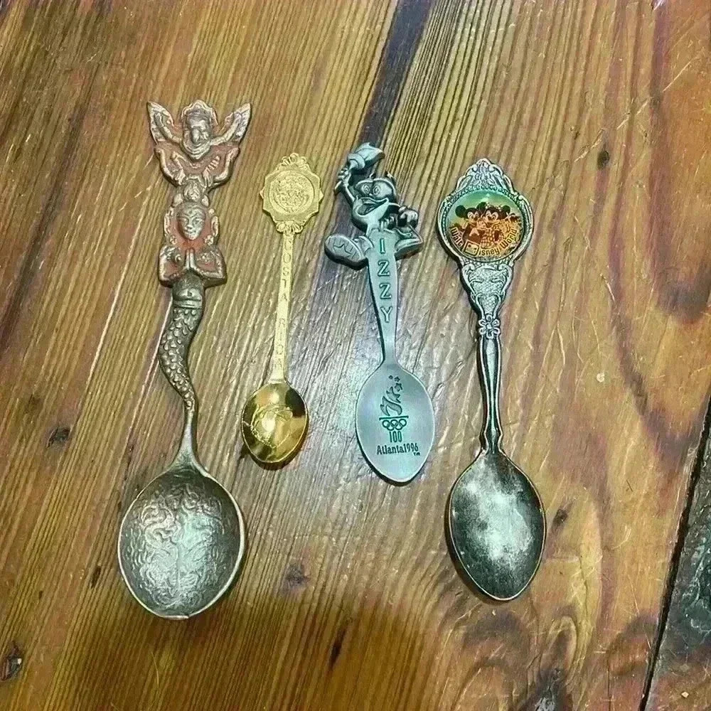 Collectible set of vintage silver plated and pewter spoons
